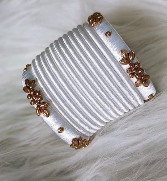 White Silk Thread Bangle Set with Golden Beads and Flower Design