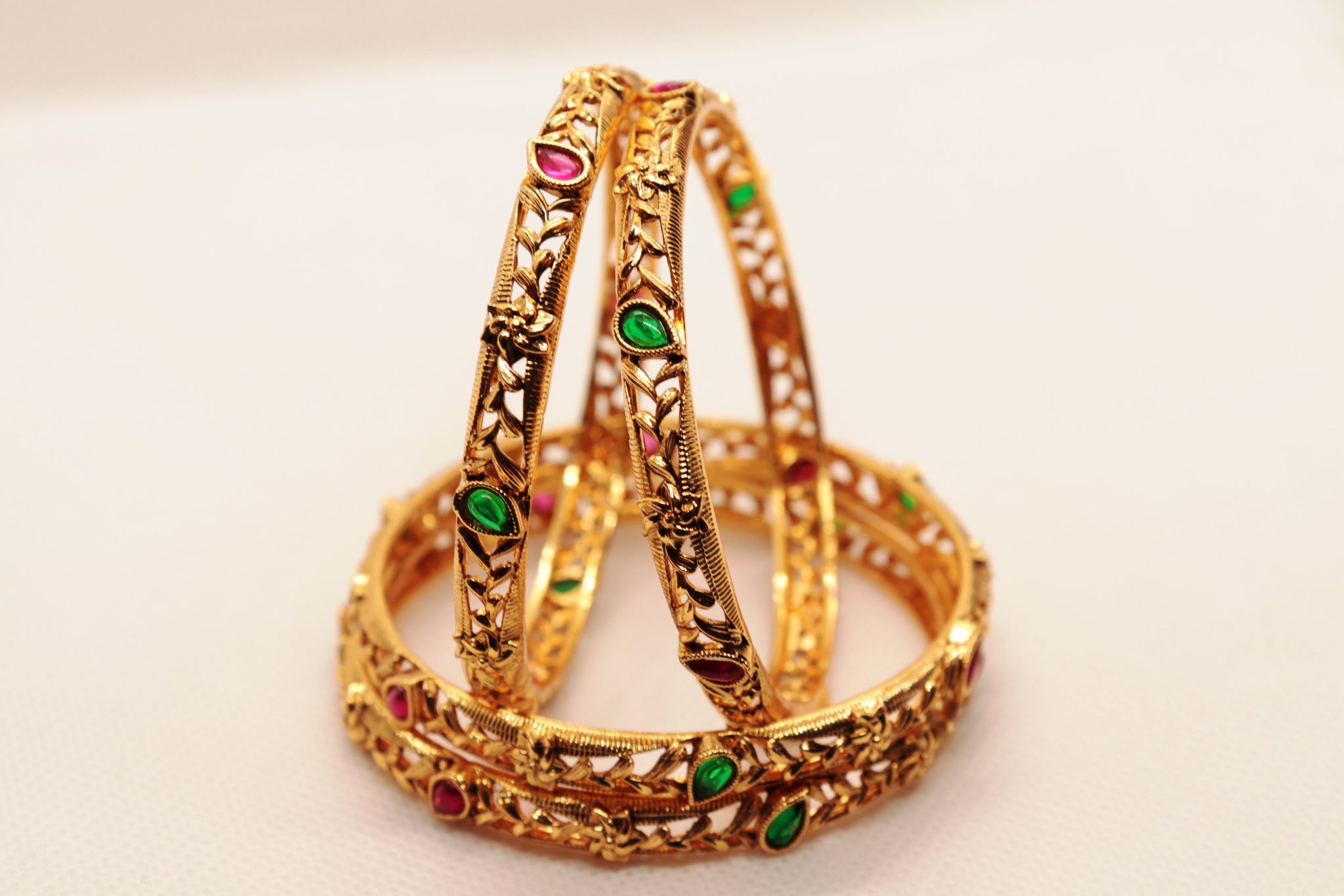 Gold Plated Filigree Work Bangle Set with Ruby and Emerald Stones