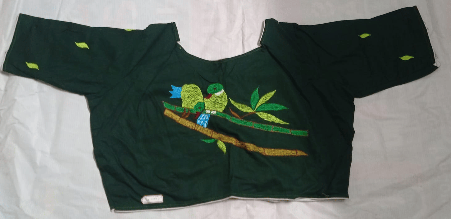 Green cotton blouse with bird embroidery