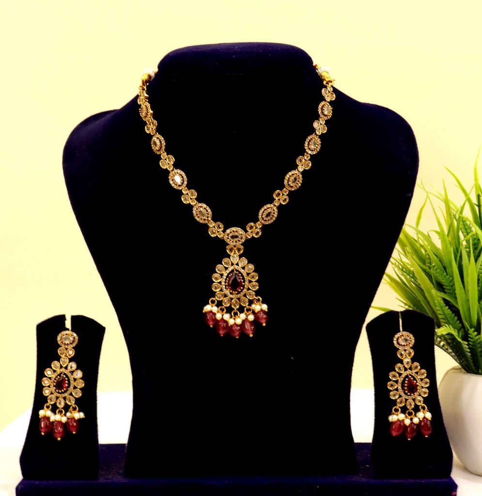 Gold Plated Kundan Necklace Set With Maroon Stones