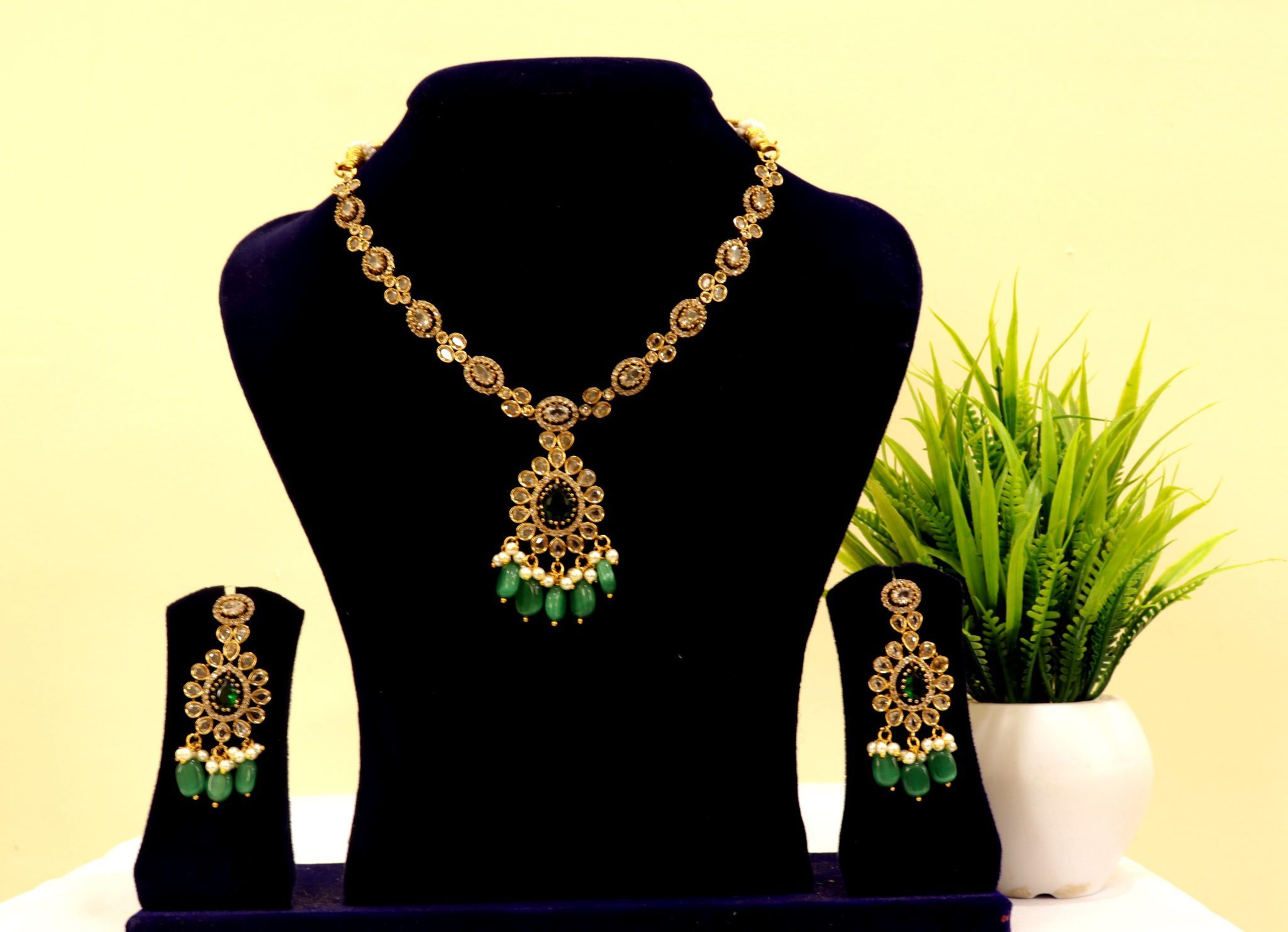 Gold-plated Kundan and Pearl Choker Necklace Set with Green Stones