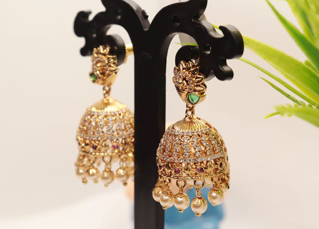 Stunning Pearl and Cubic Zirconia Jhumka Earrings in Gold Plated Alloy