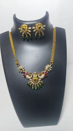 Gold-plated traditional Indian necklace set with white and green stones