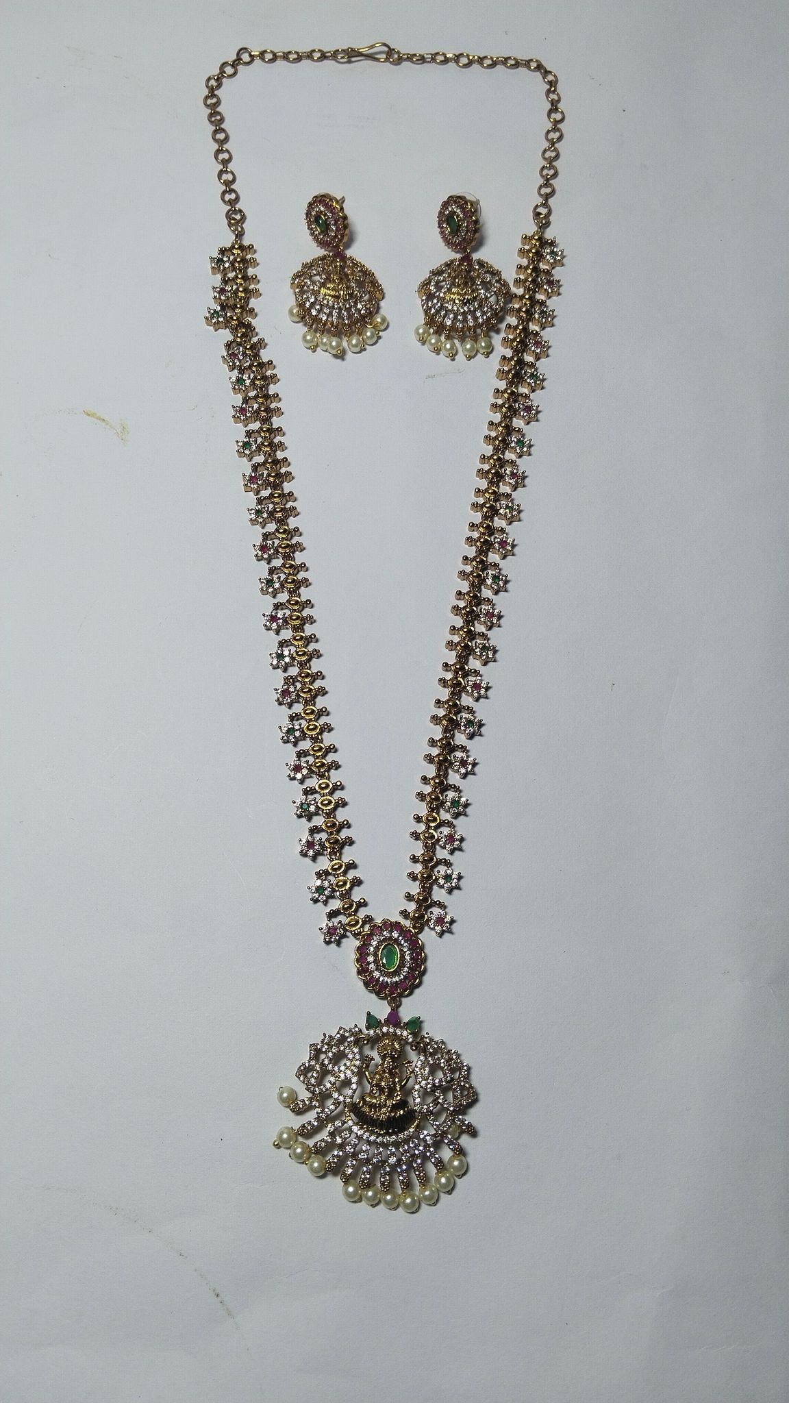 "Stunning Lakshmi Pendant Necklace Set with Earrings in Gold Plated Alloy"