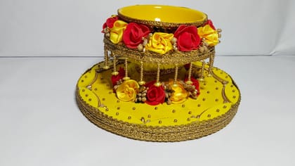 Yellow and red decorative bowl with flowers
