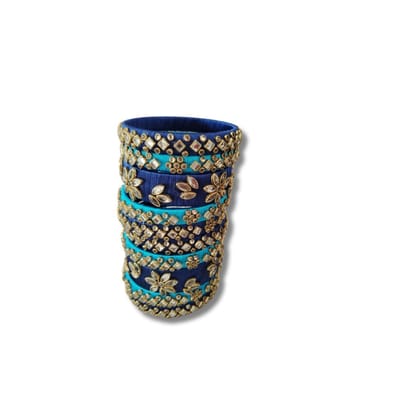 Set of 4 Blue Silk Thread Bangles with Stone and Pearl Embellishment Set of 4 Blue Silk Thread Bangles with Stone and Pearl Embellishment