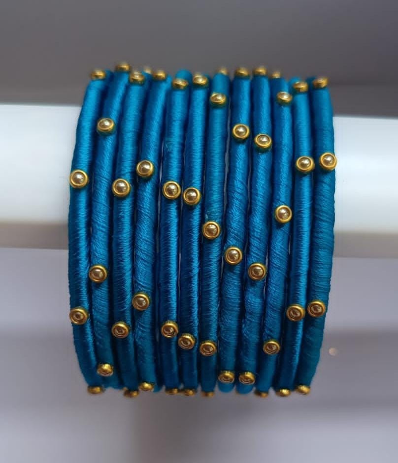 Set of 12 Blue Silk Thread Bangles with Golden Beads