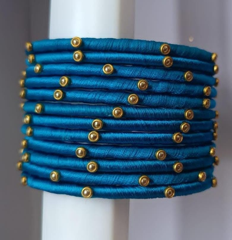 Set of 12 Blue Silk Thread Bangles with Golden Beads