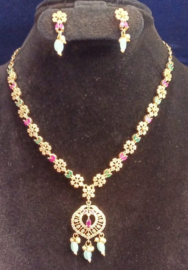 Stunning Gold-Plated Kundan Necklace Set with Pink and Green Stones