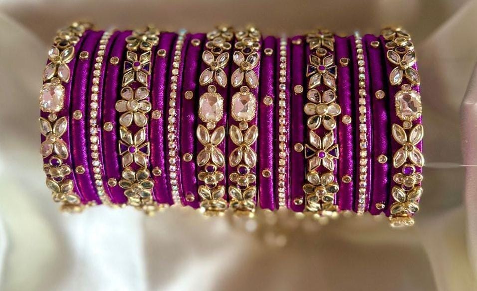 Stunning Purple Silk Thread Bangle Set with Kundan and Pearl Embellishment