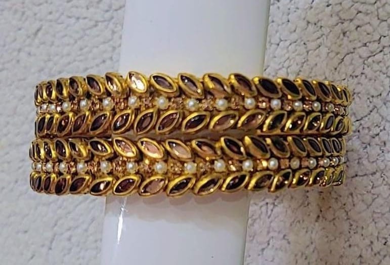 Exquisite Pearl and Gold Bangle Set with Maroon Stones