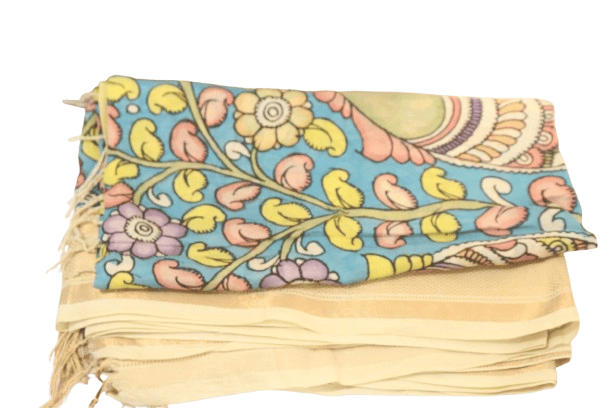 A beautiful hand-painted Madhubani cotton silk saree with intricate floral and peacock motifs.