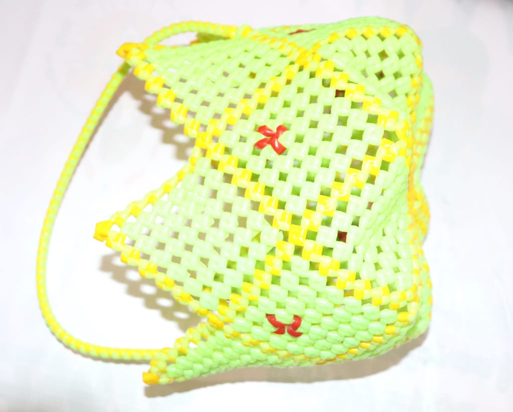 Green and Yellow Beaded Basket with Red Flower Accents