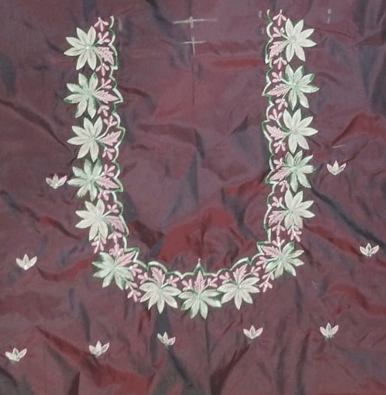Embroidered boat neck blouse with floral motifs
