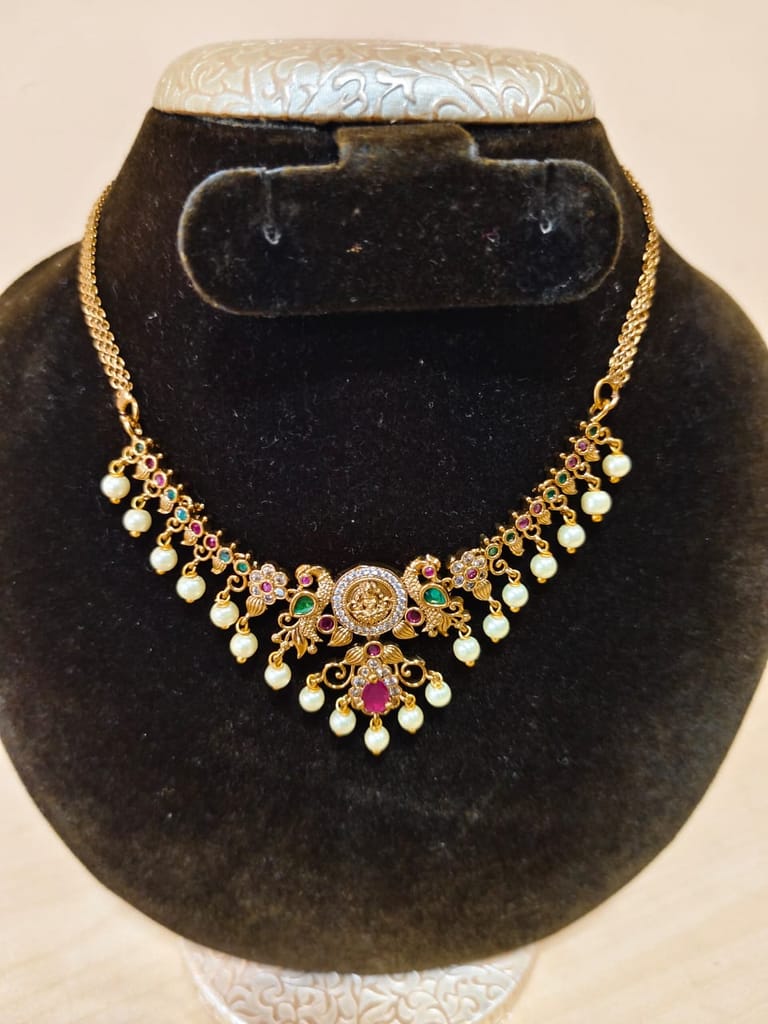 "Stunning Antique Gold Necklace Set with Peacock Earrings and Pearls"