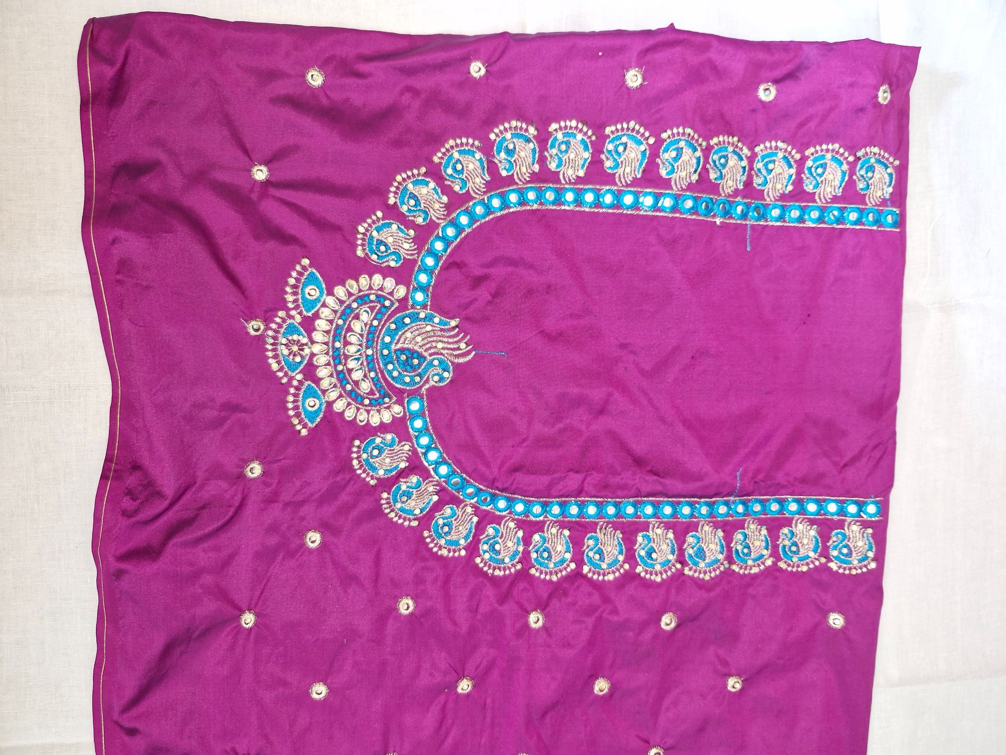 "Exquisite Hand Embroidered Peacock Blouse Design with Mirror Work"