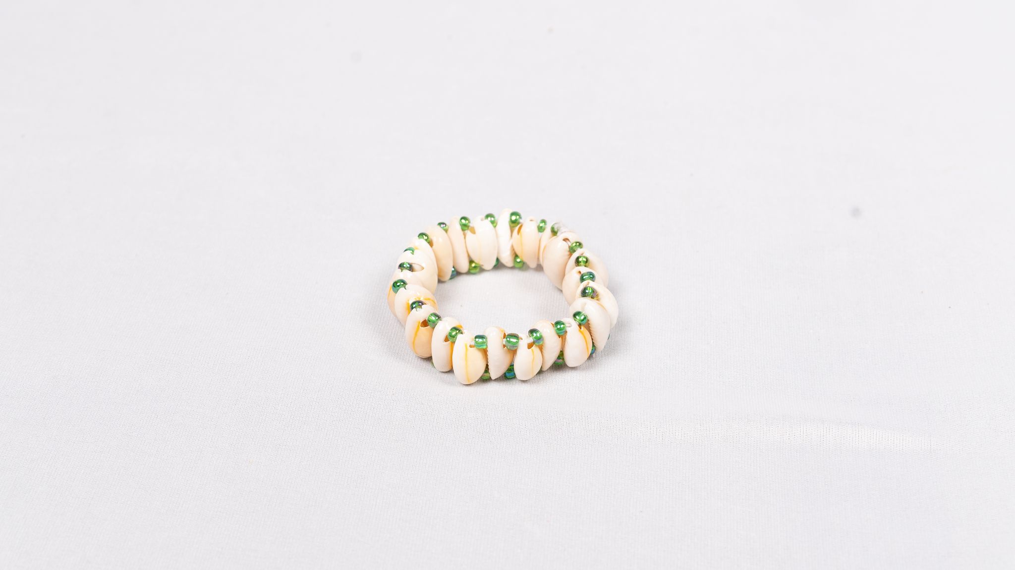 Handmade Seashell Bracelet with Green Accents