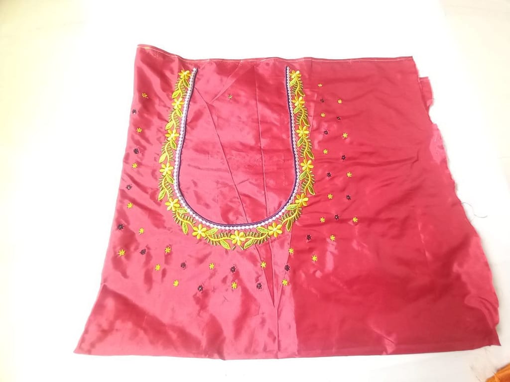 Red color Embroidered Blouse Piece With Floral Butta Work