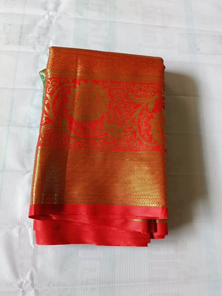 Red and gold zari work silk saree with blouse piece