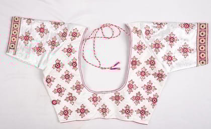 White cotton blouse with hand embroidered silver zari and pink thread work