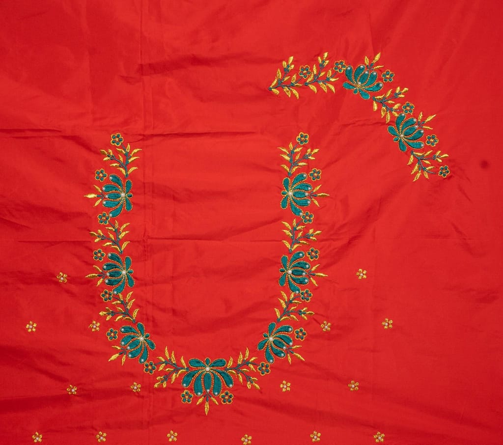 Red and gold embroidered blouse piece