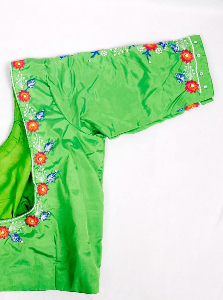 Green blouse with floral embroidery