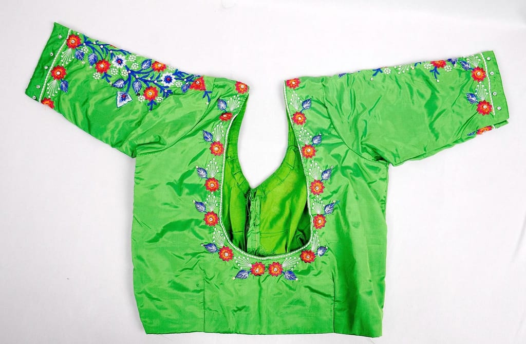 Green blouse with floral embroidery