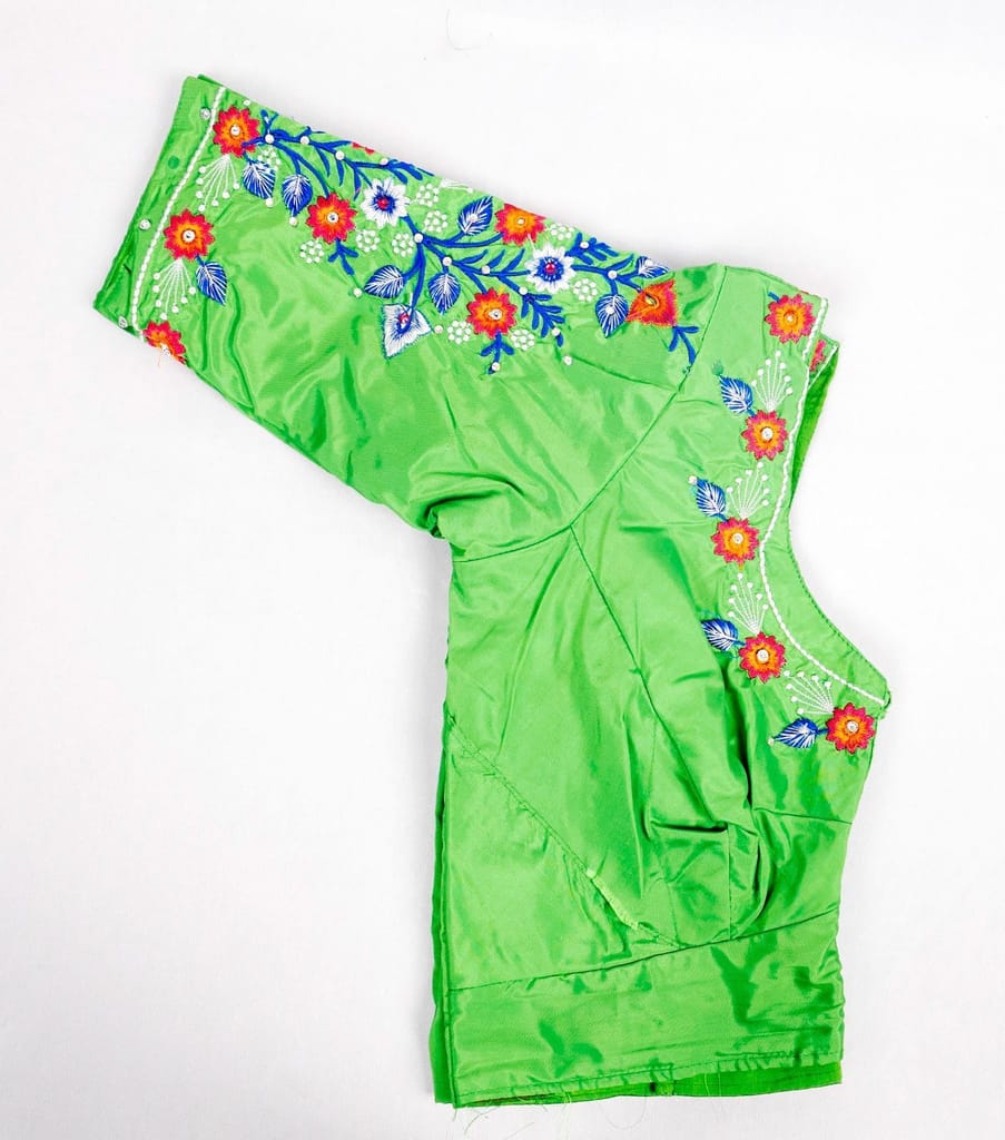 Green blouse with floral embroidery
