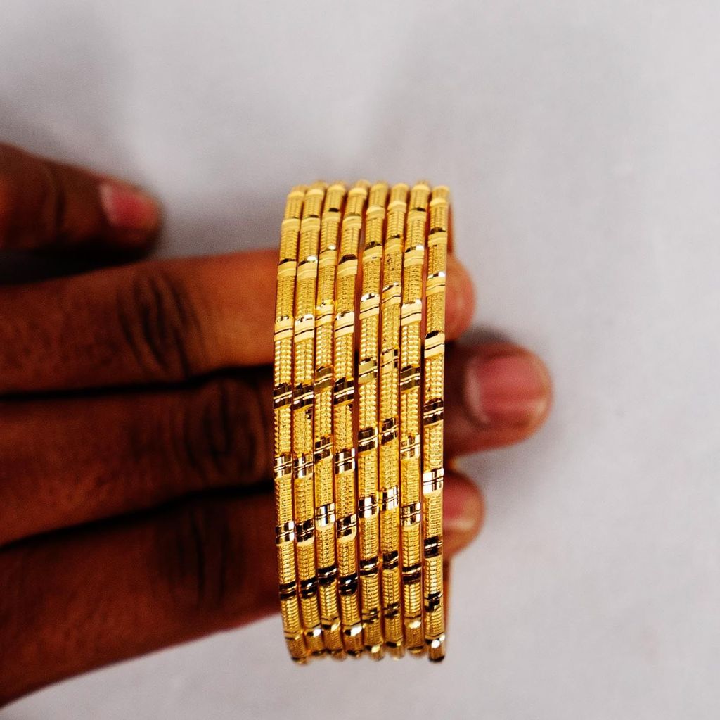 Alloy gold plated fancy bangles