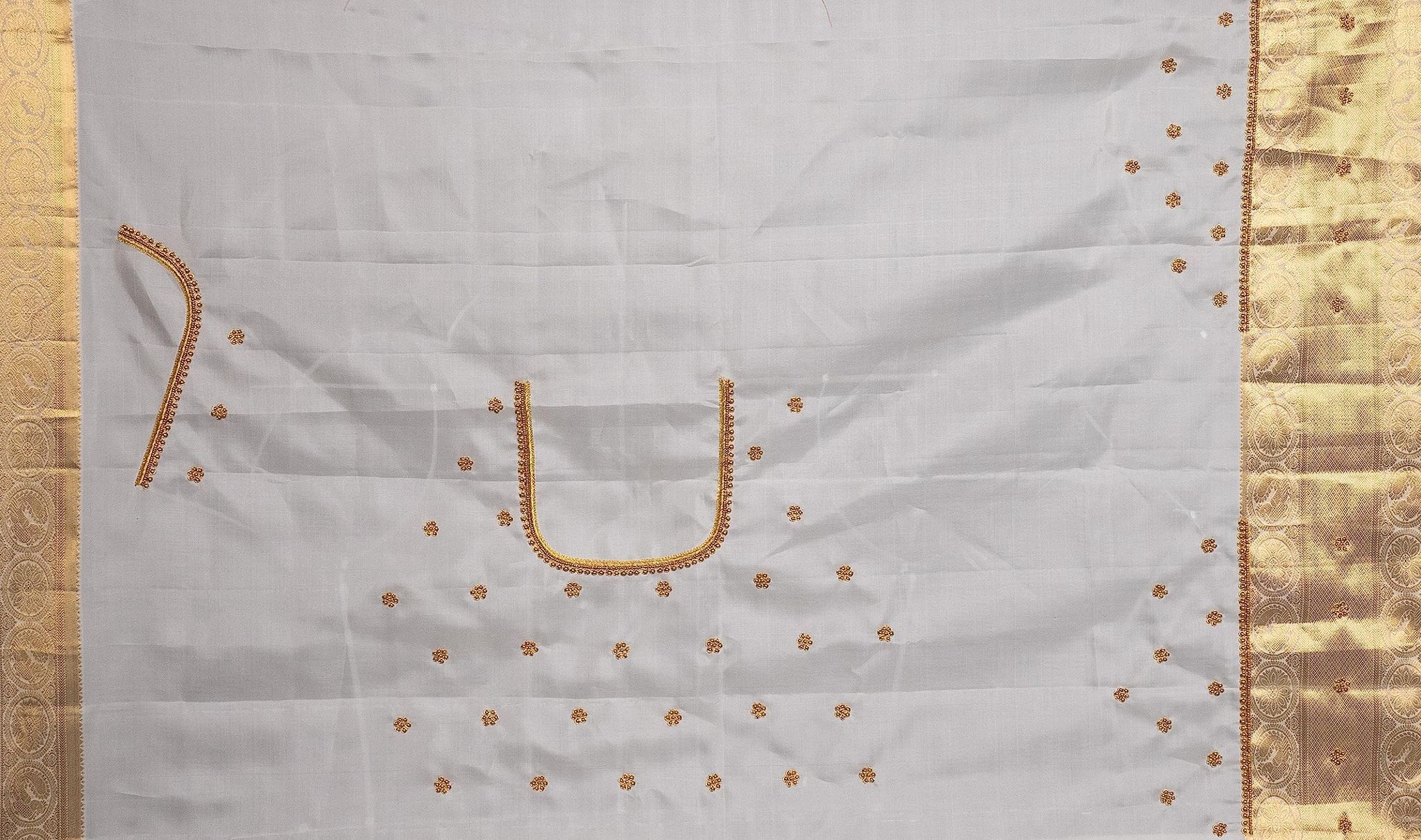 White Saree With Golden Embroidery Work