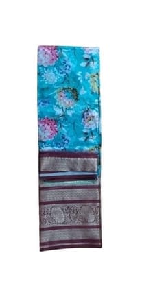 Blue Georgette Saree With Pink Floral Print And Zari Border Blue Georgette Saree With Pink Floral Print And Zari Border