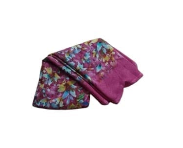 A beautiful lightweight scarf with a floral print in shades of pink, blue, yellow, and green. A beautiful lightweight scarf with a floral print in shades of pink, blue, yellow, and green.