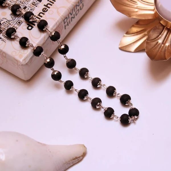  Black beaded necklace with silver accents