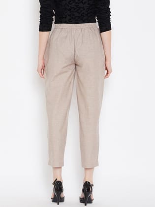 Women Beige Relaxed Regular Fit Solid Peg Trousers