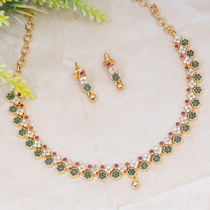 Elegant Floral Green and Red Stone Necklace Set with Gold-Toned Idol Accents