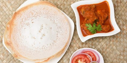 Appam With Chicken Curry