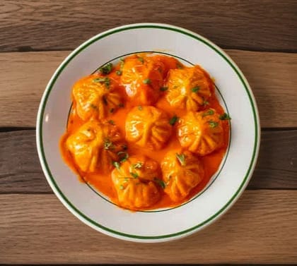 Paneer Achari Gravy Momos