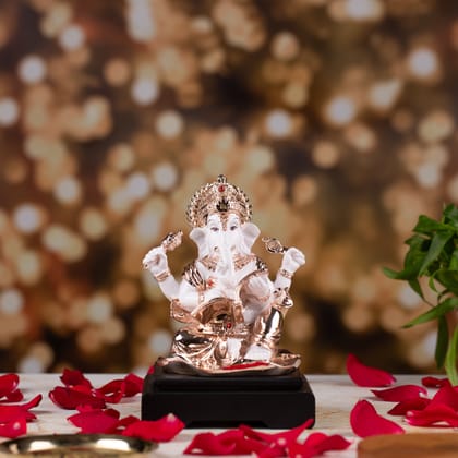 Ganesh Ji||Radiant Rose Gold Polercyin Showpiece: Elegance in Every Detail"