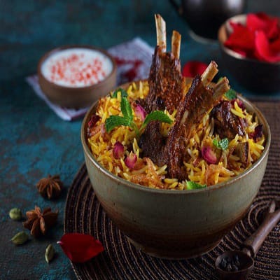 Mutton Dum Biryani Served Raita & Salad