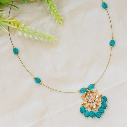 Elegant Teal Gemstone Invisible Necklace with Gold-Toned Floral Pendant