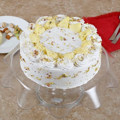 Vanilla Flavored Pista Rasmalai Cake 1 Kg Eggless