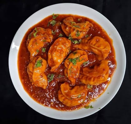 Paneer Schezwan Gravy Momos