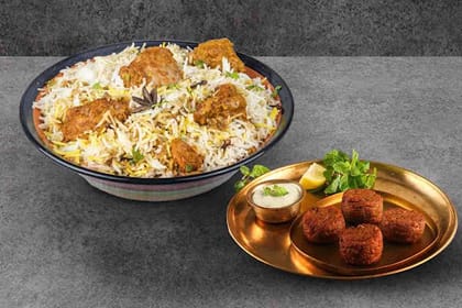 Non-Veg Biryani & Starter Combo __ Lucknowi Mini Chicken Biryani,Potato Wedges (Medium)