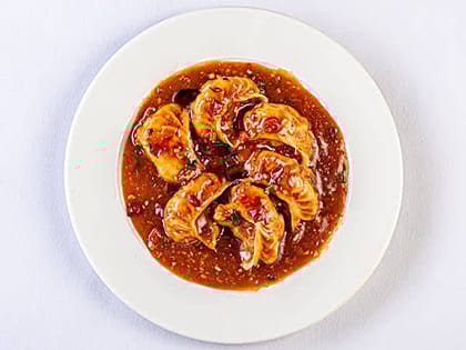 Chicken Schezwan Gravy Momos