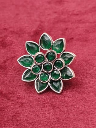 Silver plated green stone studded floral stud earrings