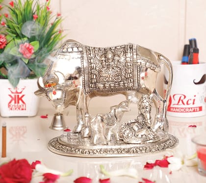 DreamKraft Metal Kamdhenu Cow & Calf with Bal Gopal Krishna Statue for Good Luck (Silver, 19 x 13.5 x 17 cm)