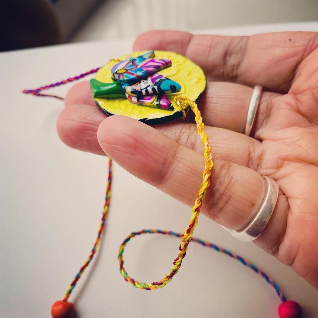 Lotus Clay Rakhi - 1 piece