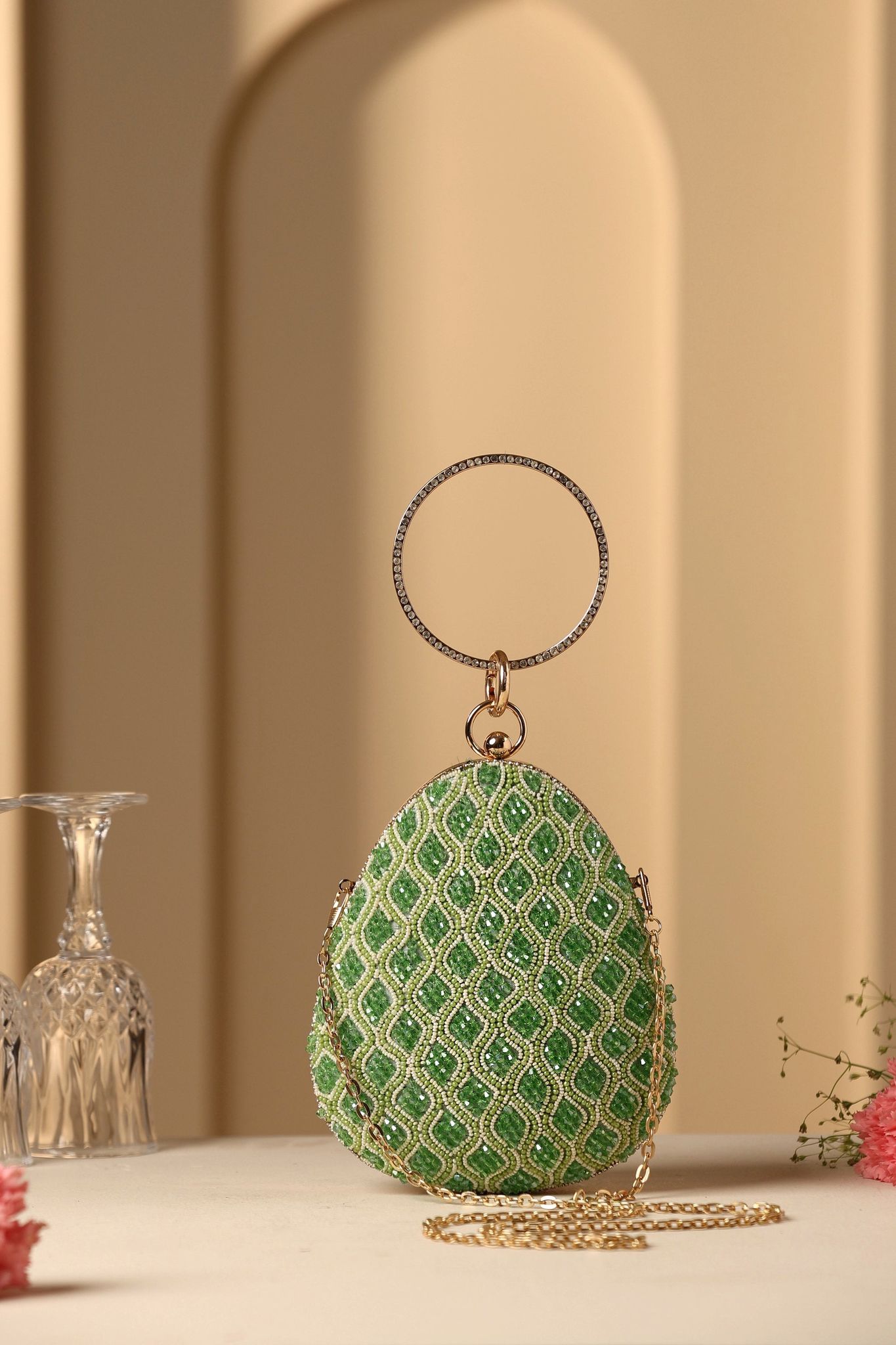 Aparna Green Oval Clutch Bag