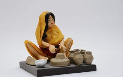 Handmade lady making pottery