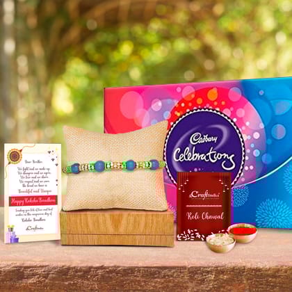 Designer Pearl Rakhi with Cadbury Celebrations Gift Pack of 7 Assorted Chocolates and Roli Chawal Pack, Best Wishes Greeting Card